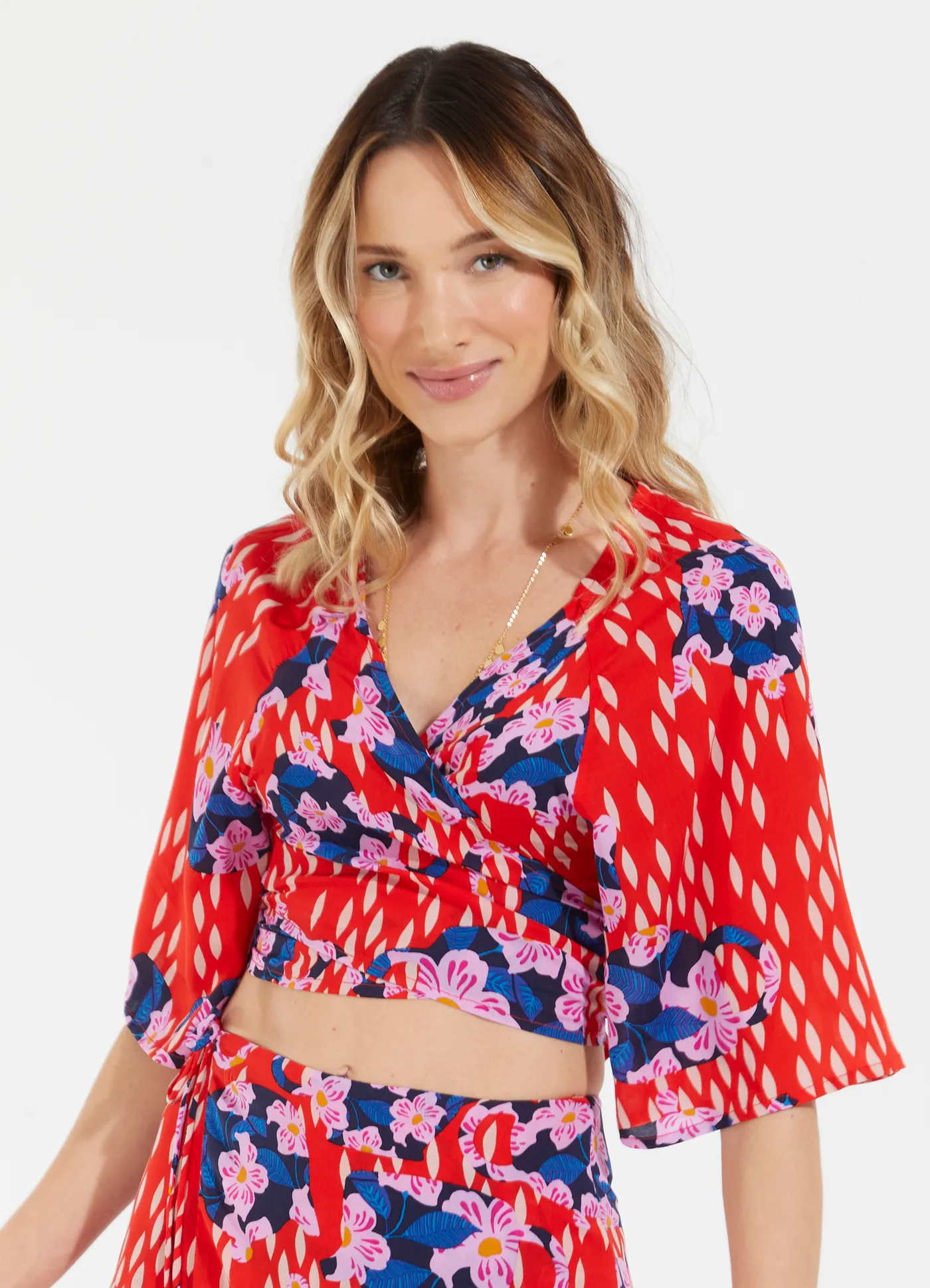 Blusa transpasse estampada bules