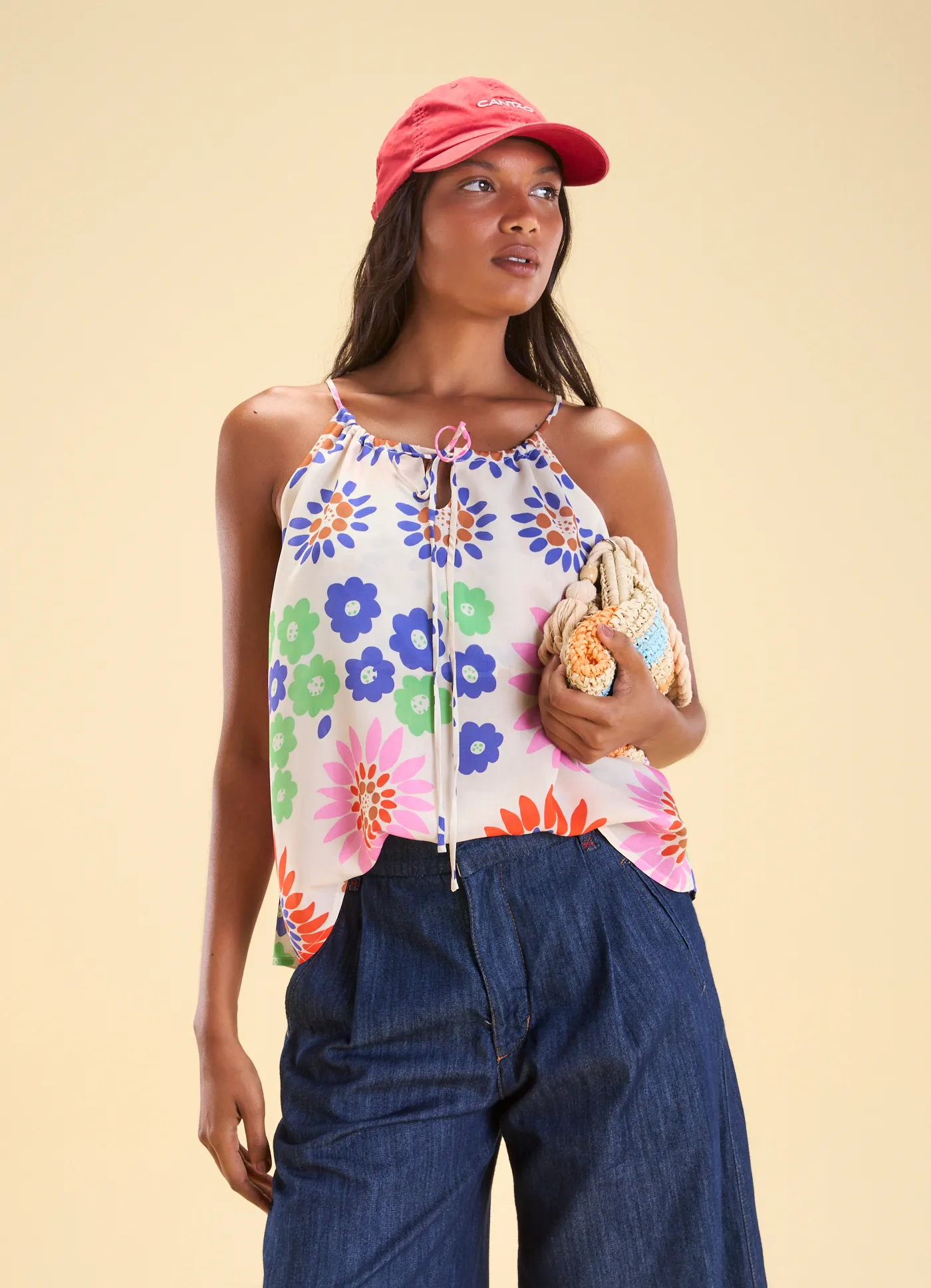 Blusa alça amarração estampada gérberas