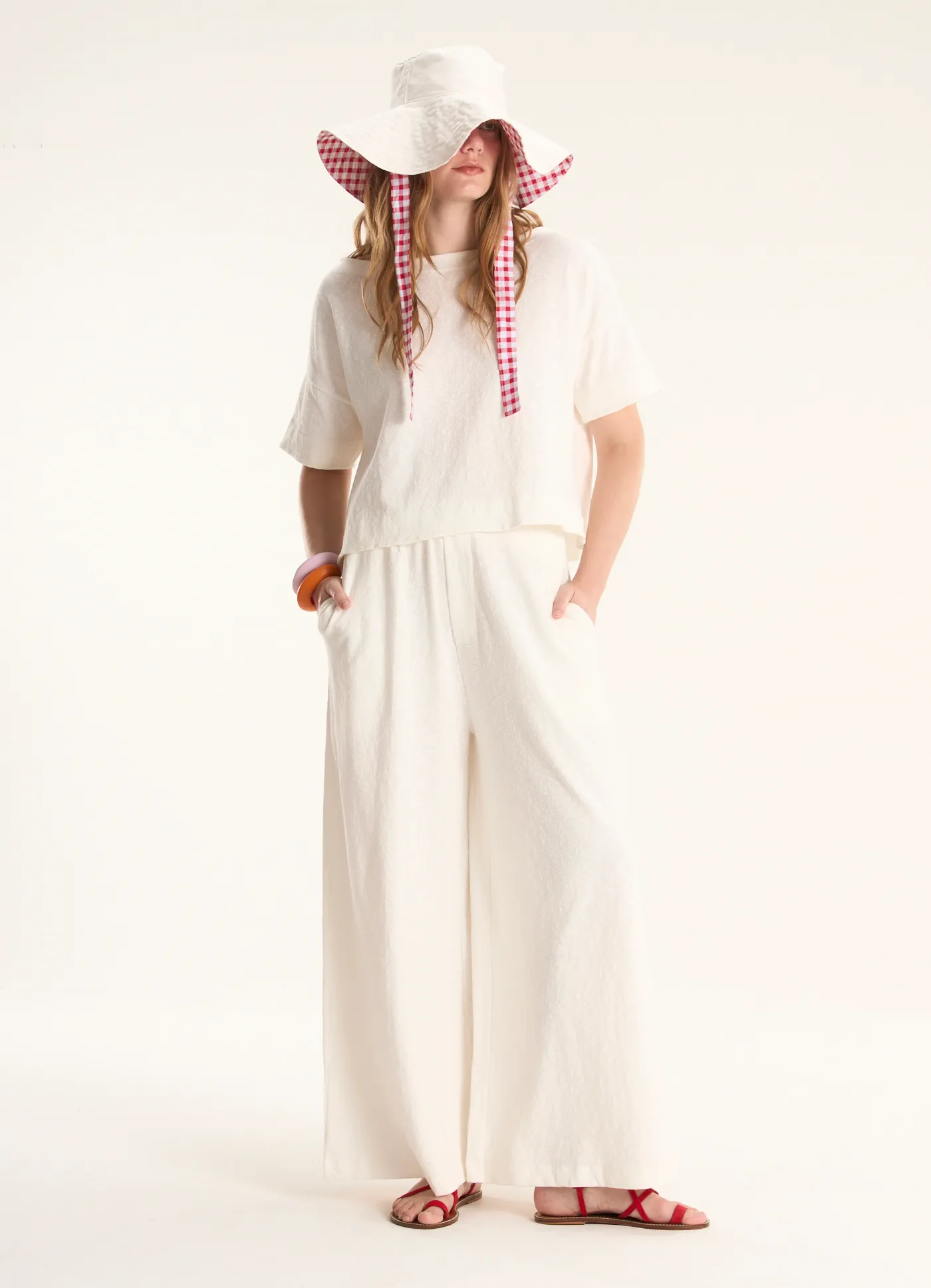 Calça pantalona malha crepe flamê off white