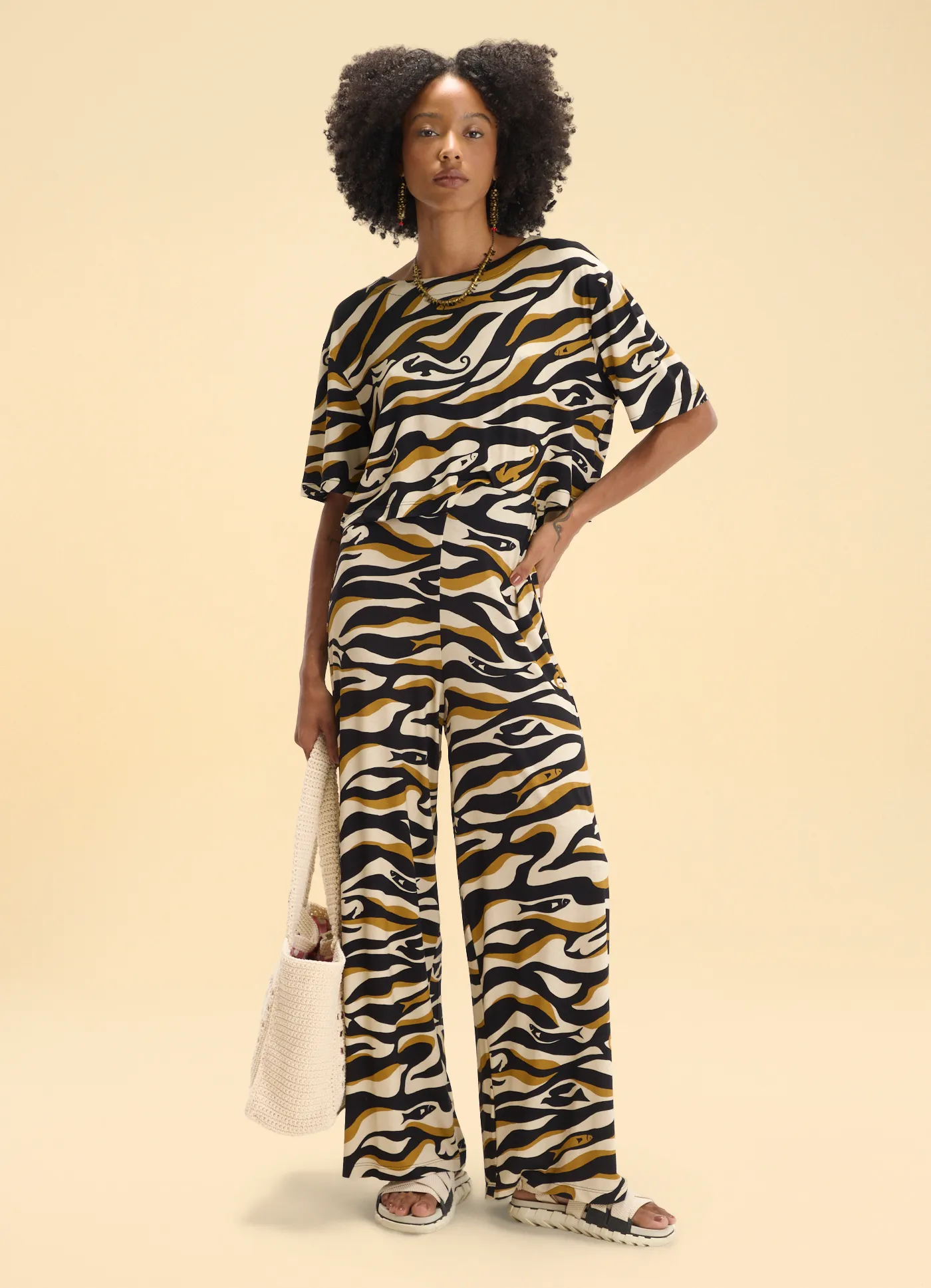 Calça malha estampada ondas