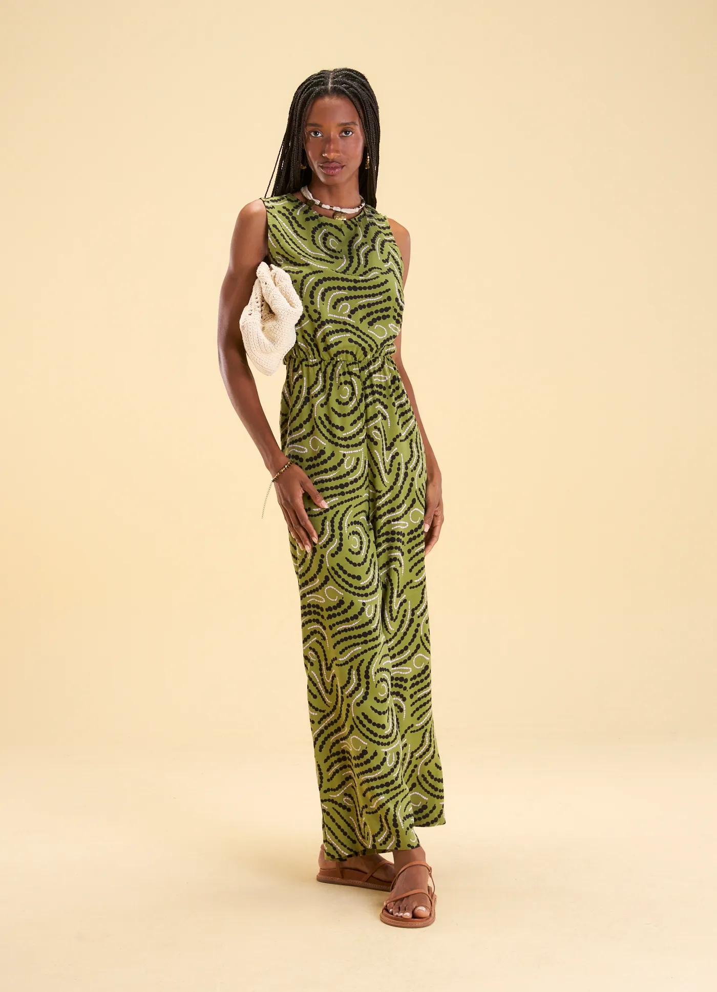 Macacão acinturado estampado caminho do vento